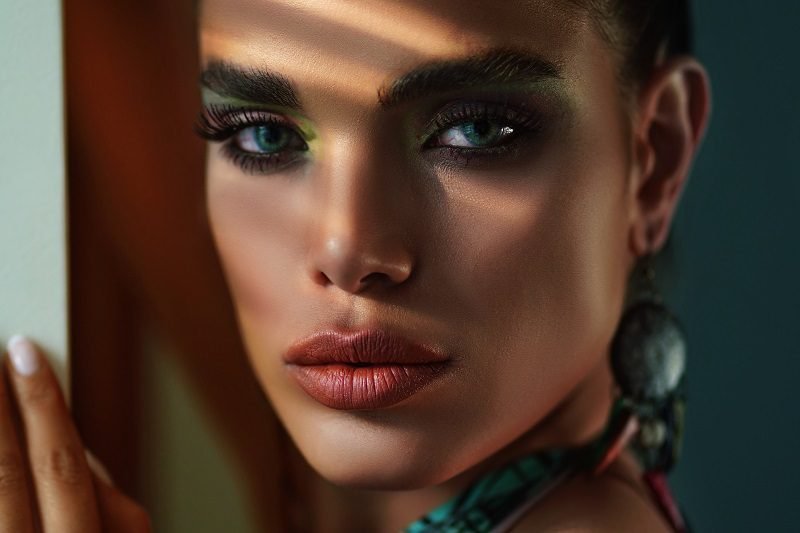 Eye Makeup Ideas for Blue Eyes Over 40 Close Up of Woman with Light from a Window on Her Face